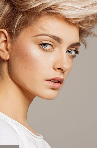 Portrait of young girl with blond fashion hairstyle